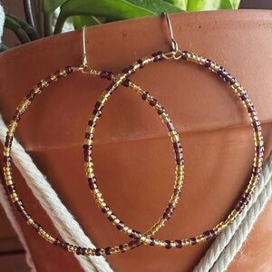 Handmade seed bead hoop earrings. 3” length